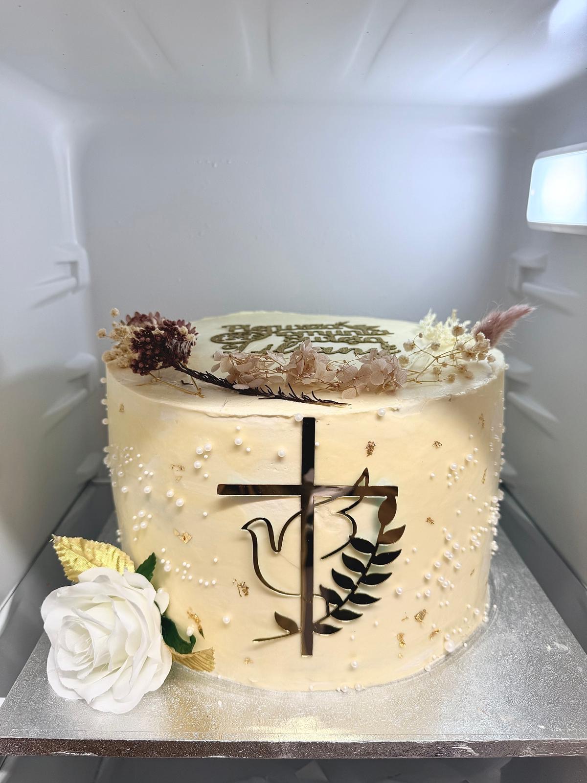 Ivory buttercream communion cake with dried flowers